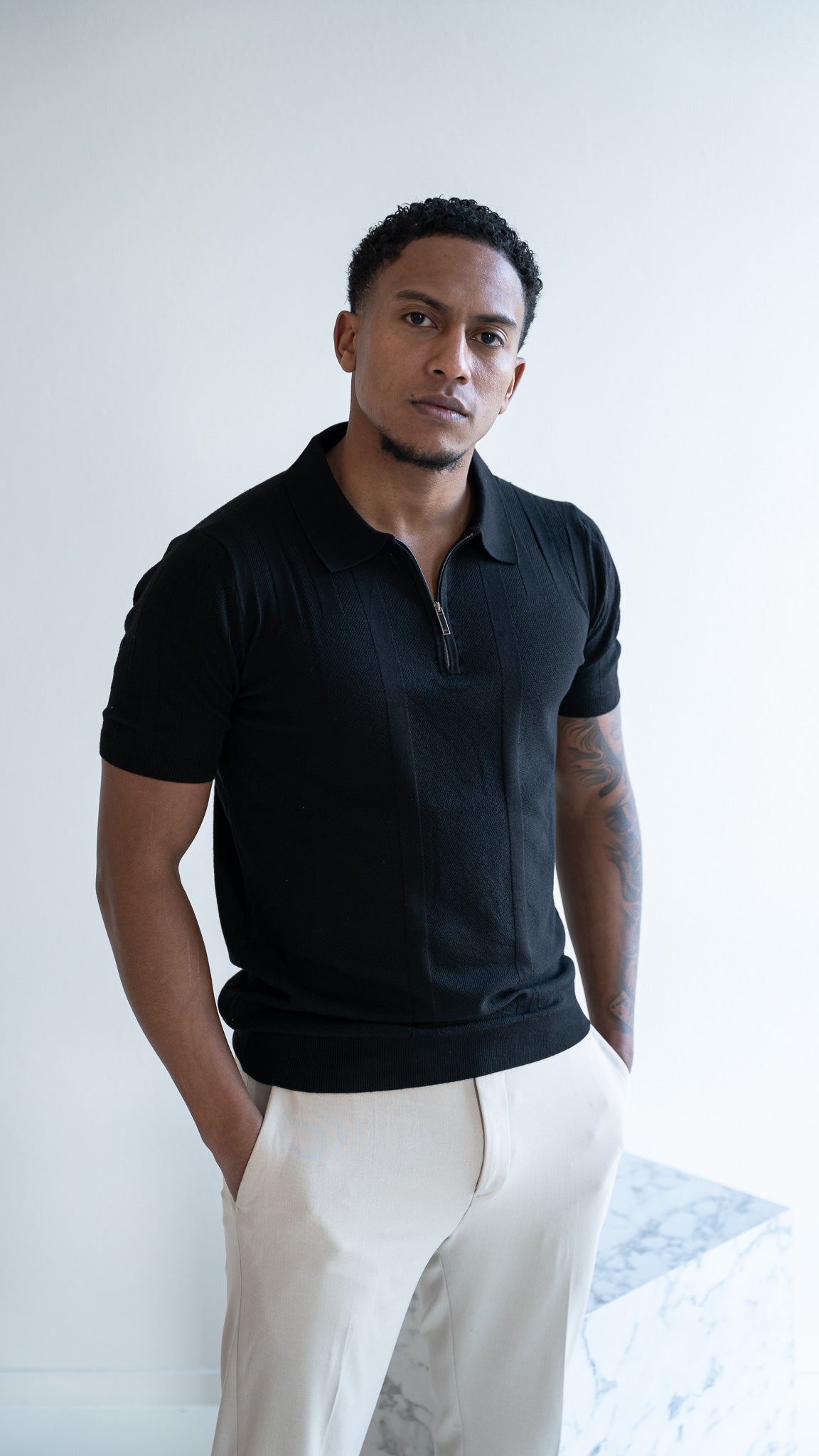 The Lucian Zip - black